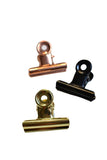 Pince à papier en métal noir, or ou Or rose - Shirley Chiche planner